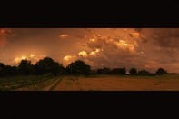 Cellule orageuse au dessus du sud-est de l'Allemagne (Bade Wurtemberg) vu dans la lumière dorée du soir depuis Village-Neuf, Haut-Rhin, Alsace, France à 20h45, samedi 6 juin 2015. Une atmosphère incroyable se dégageait de ce phénomène. - 06/06/2015 22:45 - Philippe Meisburger